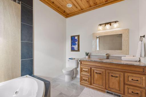 Owner’s suite with granite countertop.