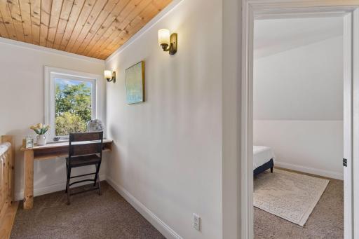 Study nook overlooking the main level and backyard view.