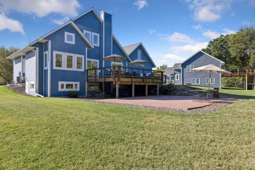 Large deck and concrete patio, perfect for entertaining.