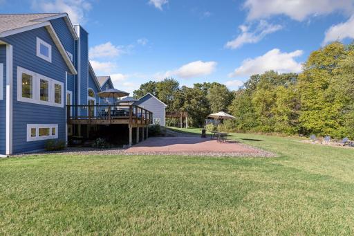 Large deck and concrete patio, perfect for entertaining.