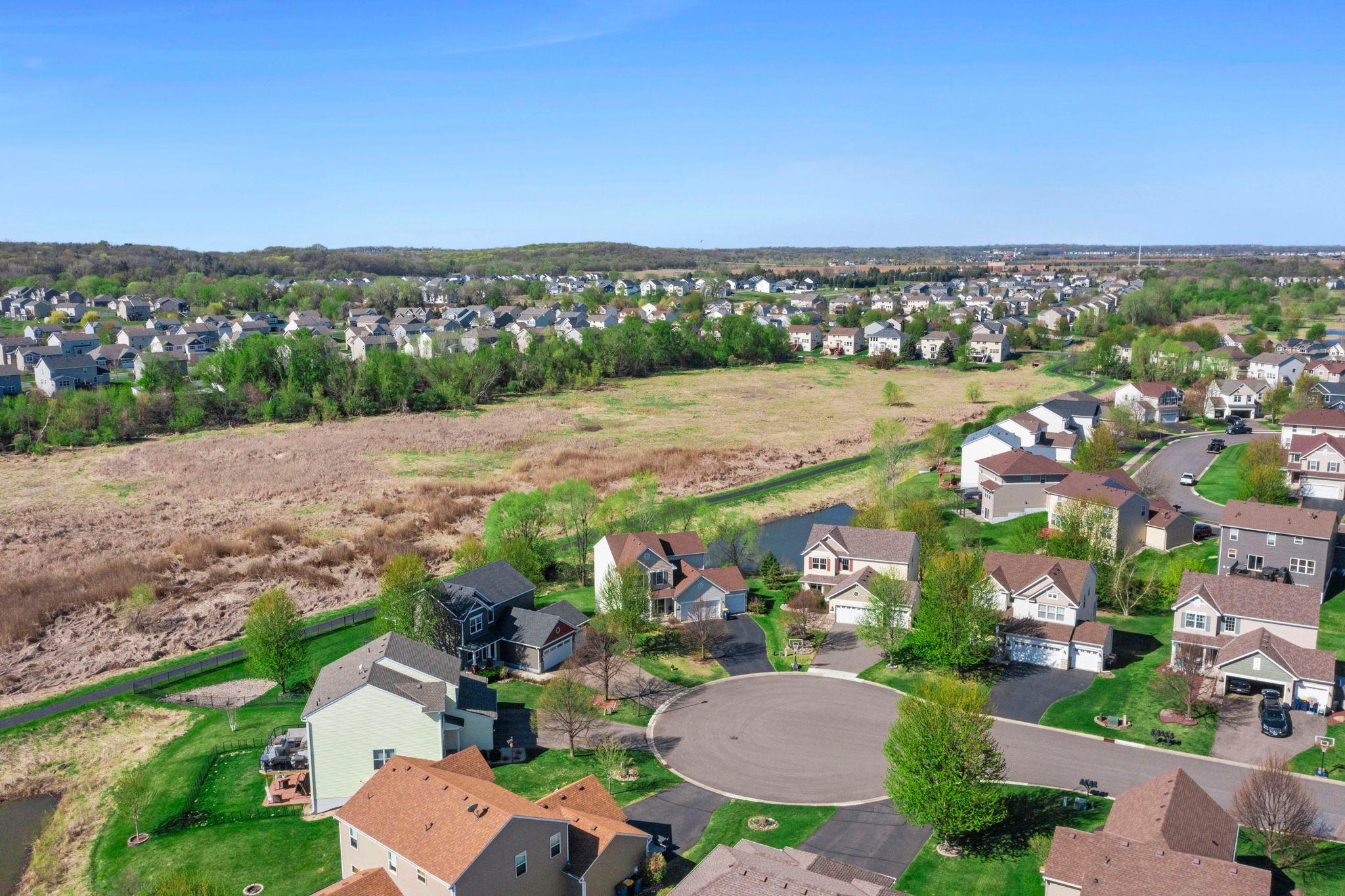 Located on a cul de sac with a pond and trails in the backyard