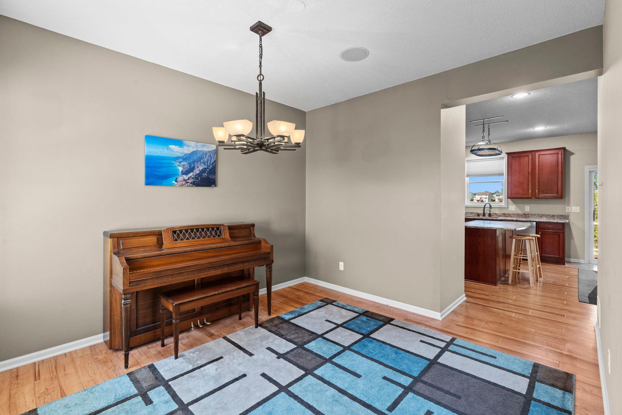 Formal dining right off the kitchen that is a perfect place to gather for holidays