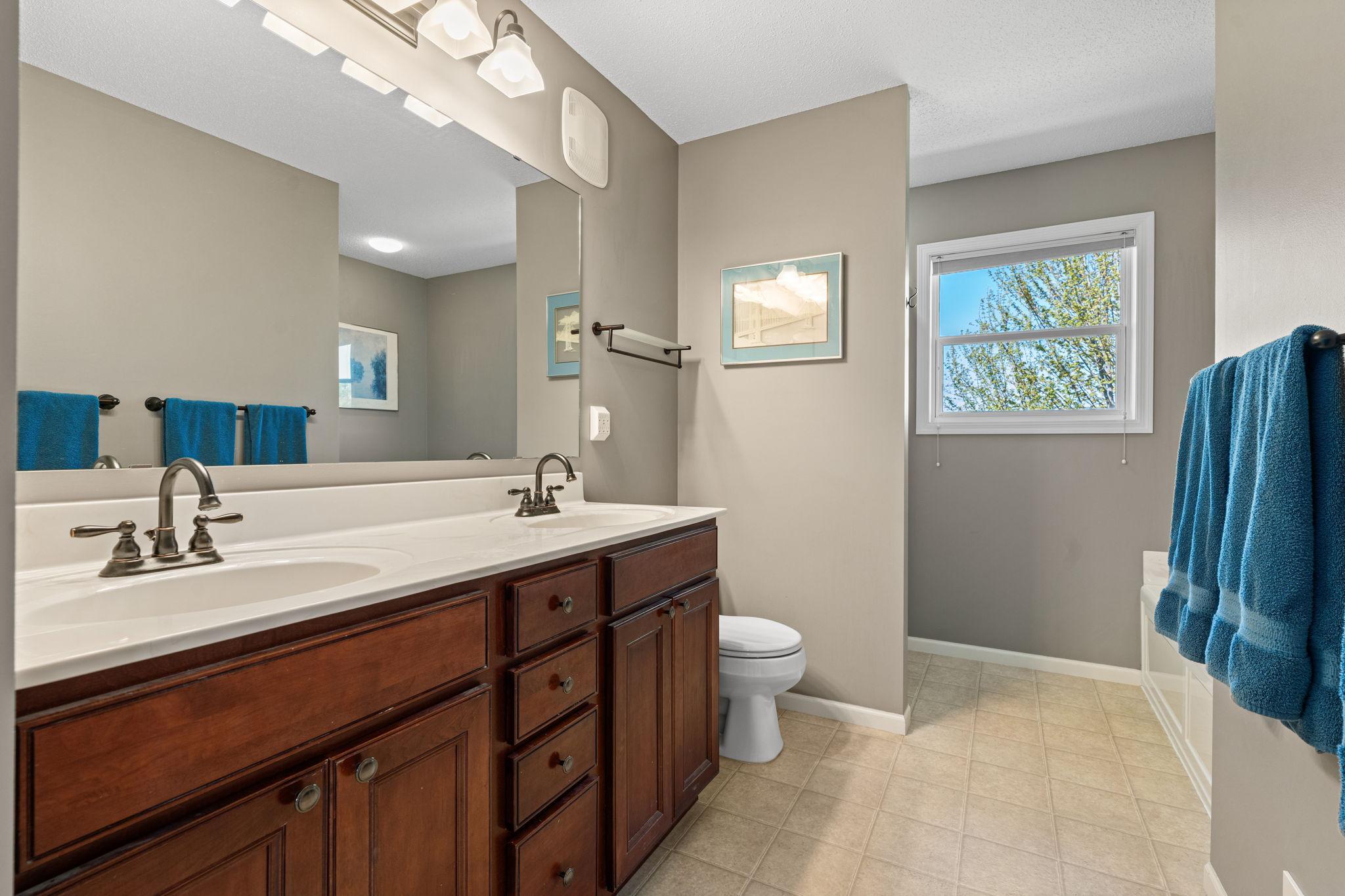 Primary bathroom with double vanity sinks