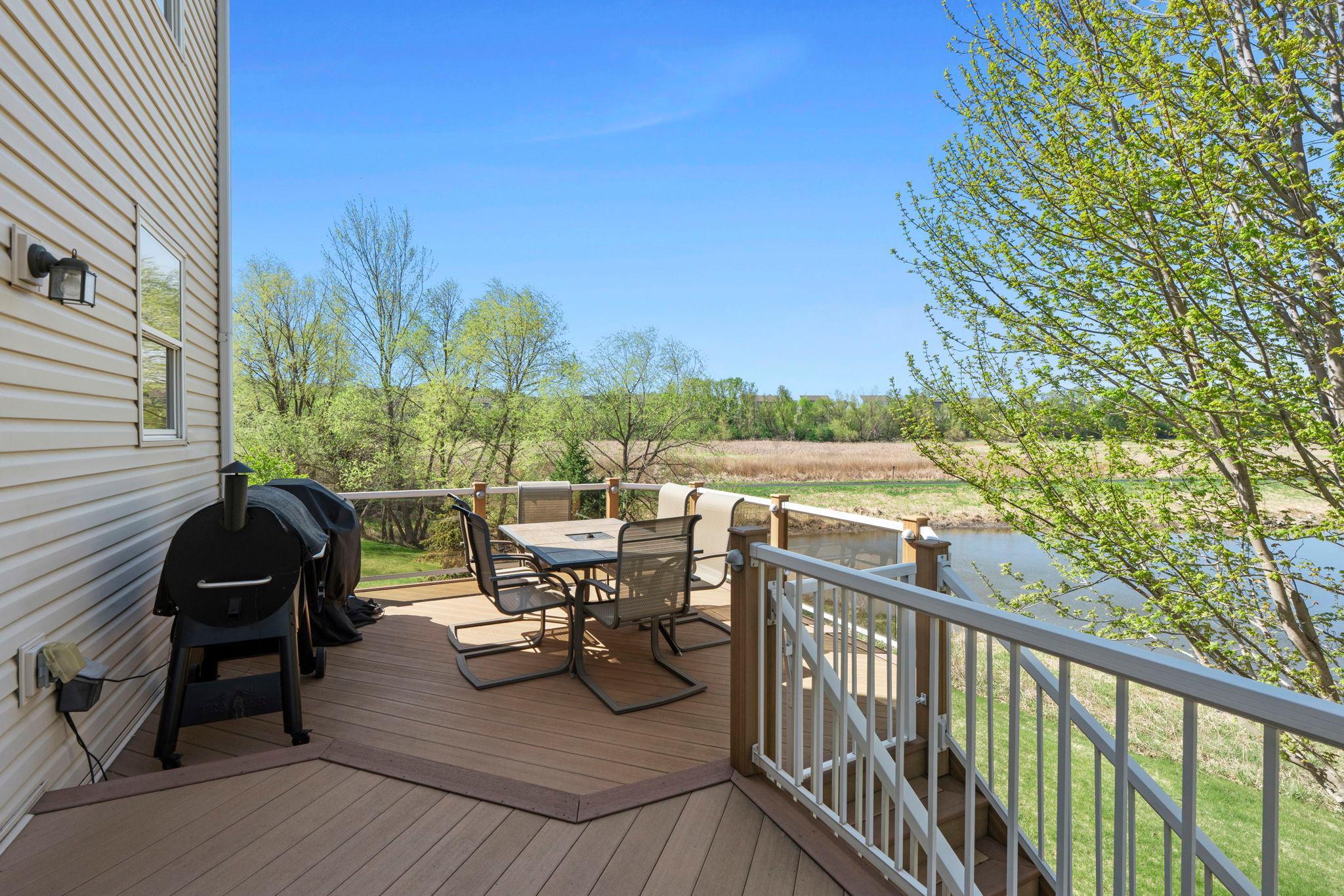 Enjoy the peaceful backyard from your maintenance free deck