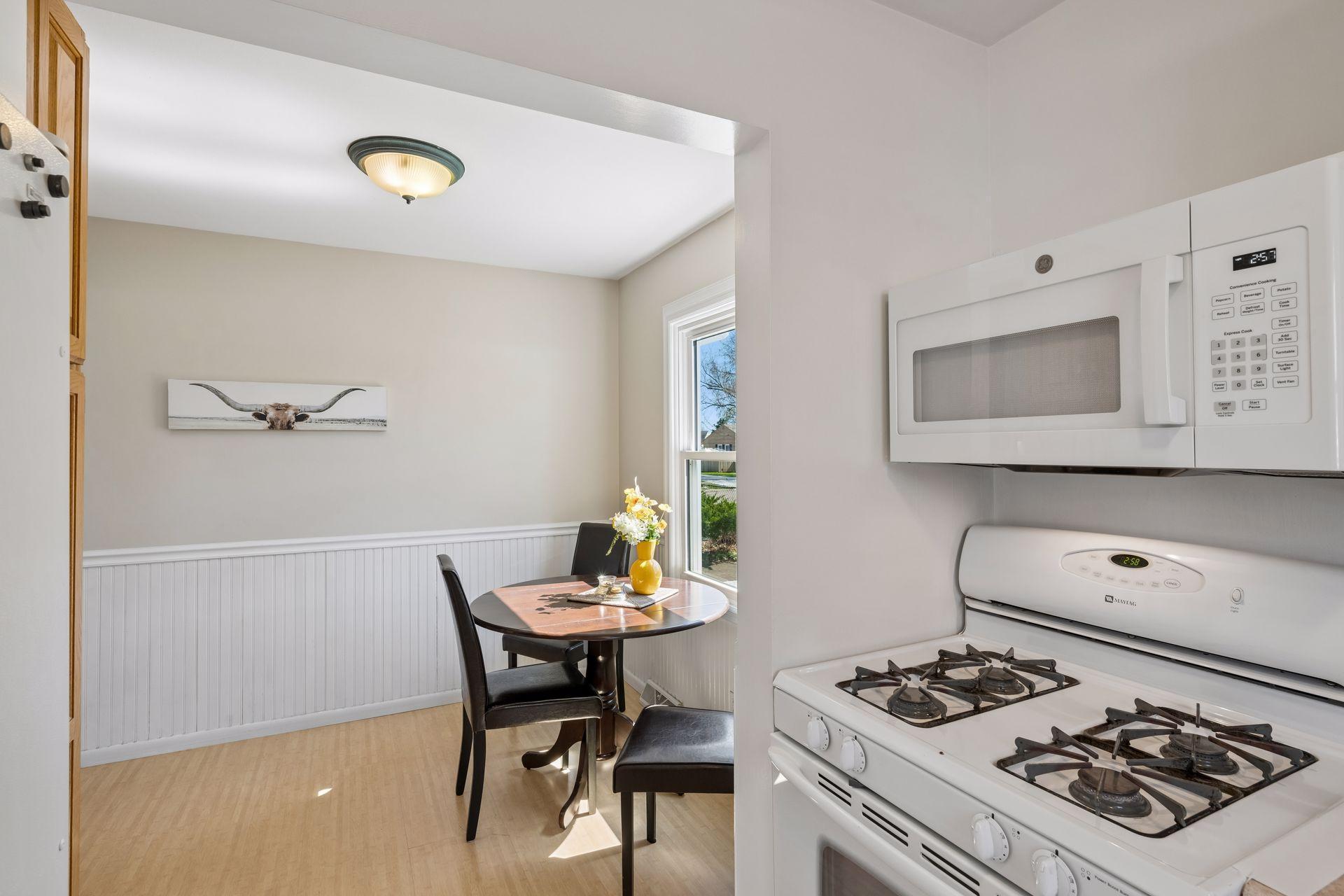 A very functional kitchen includes a gas range and dishwasher!