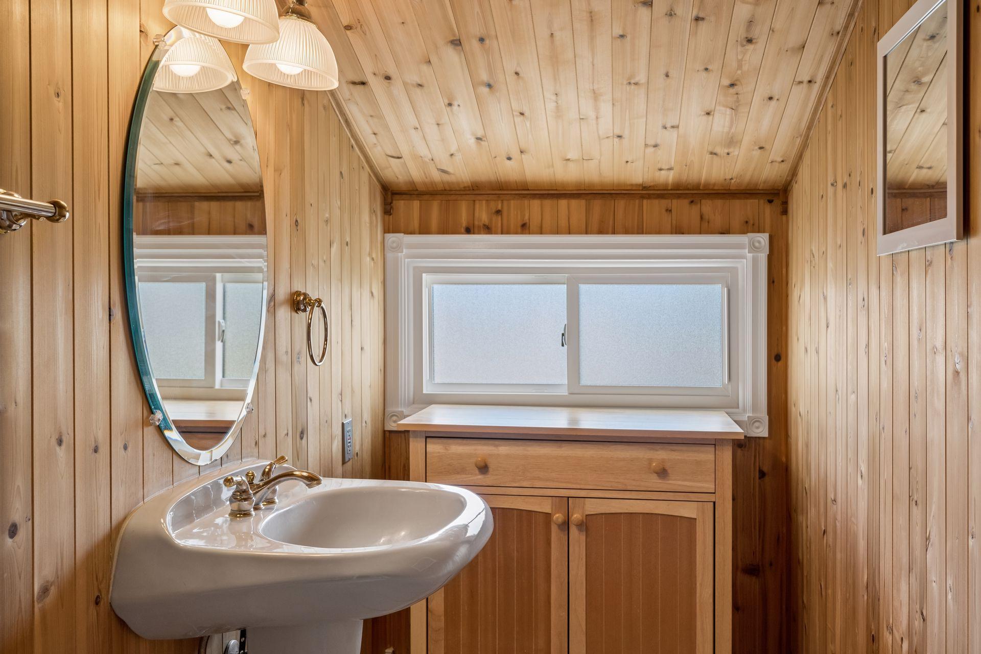 A truly charming primary bathroom offers a wonderful convenience.