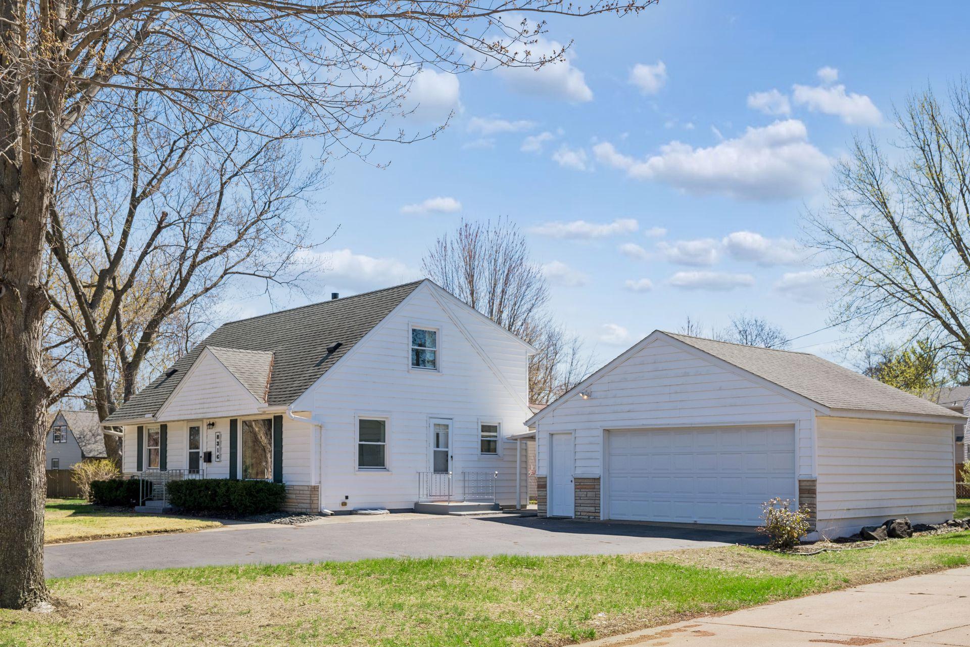 Generous off -street parking, and a large over-sized two stall garage!