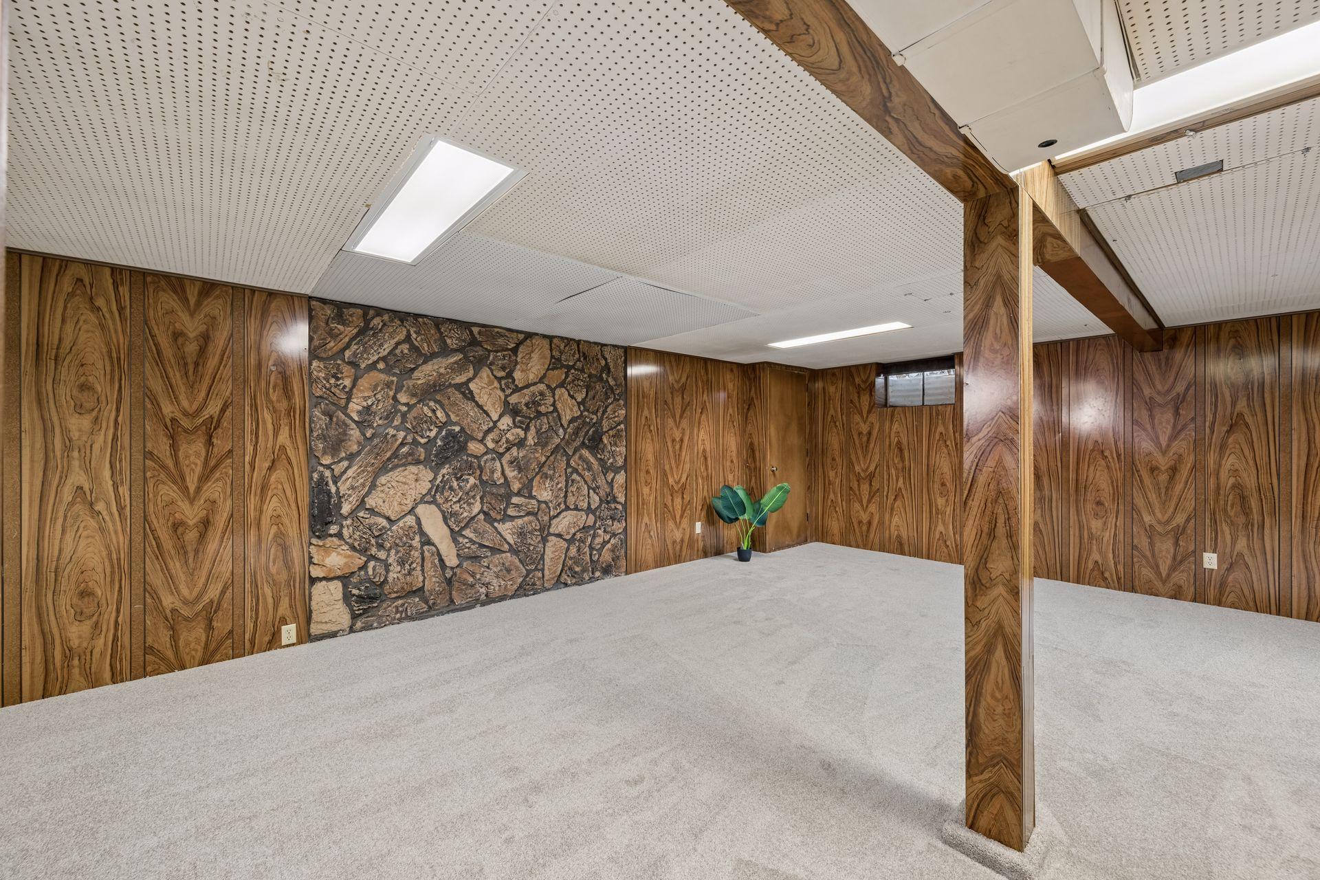 Cool rock accent wall would be the perfect back drop for your flat screen tv, or that cool 1960s lounge bar set-up!