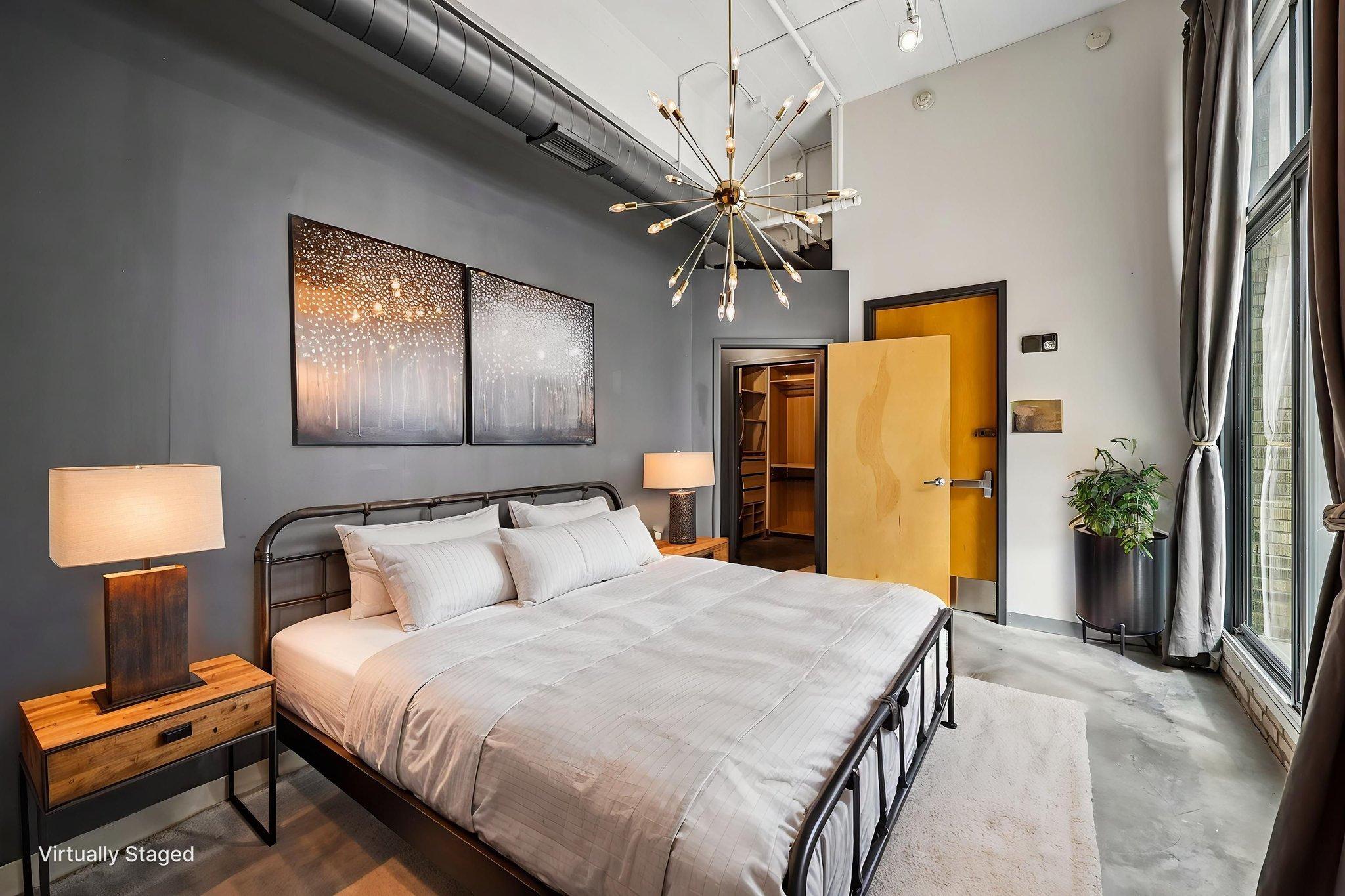 Large primary bedroom with private rooftop access.