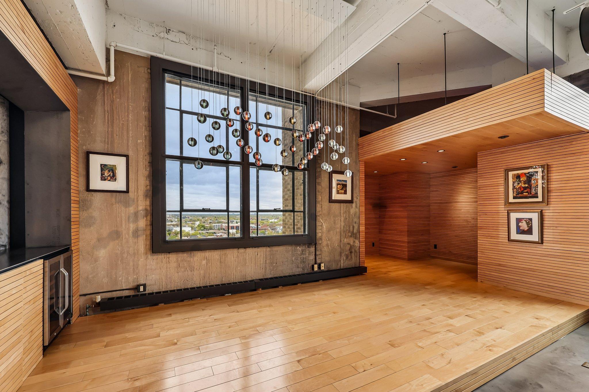 West-facing windows, custom lighting and office alcove with additional loft space above - the perfect reading nook!