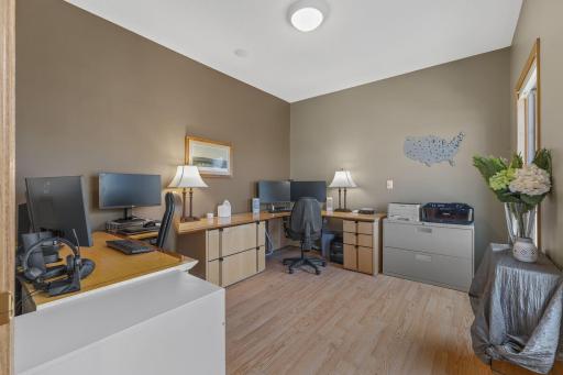 Large home office with custom built-in double desks