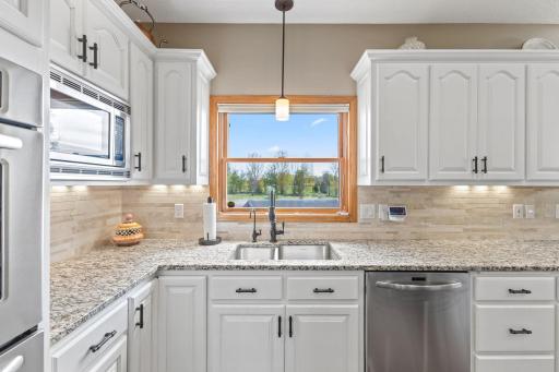 Custom cabinetry with under and over cabinet lighting