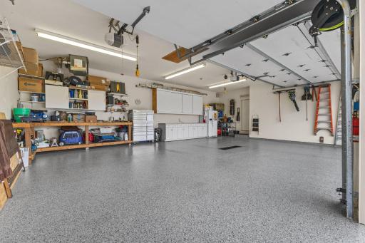 Hot & cold soft water faucet plumbed into garage (for washing cars) & New advanced poly garage floor coating 06/2025