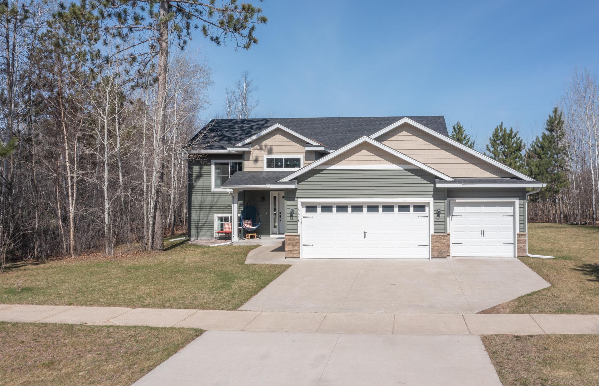 Charming curb appeal with a clean, modern look and welcoming entry.