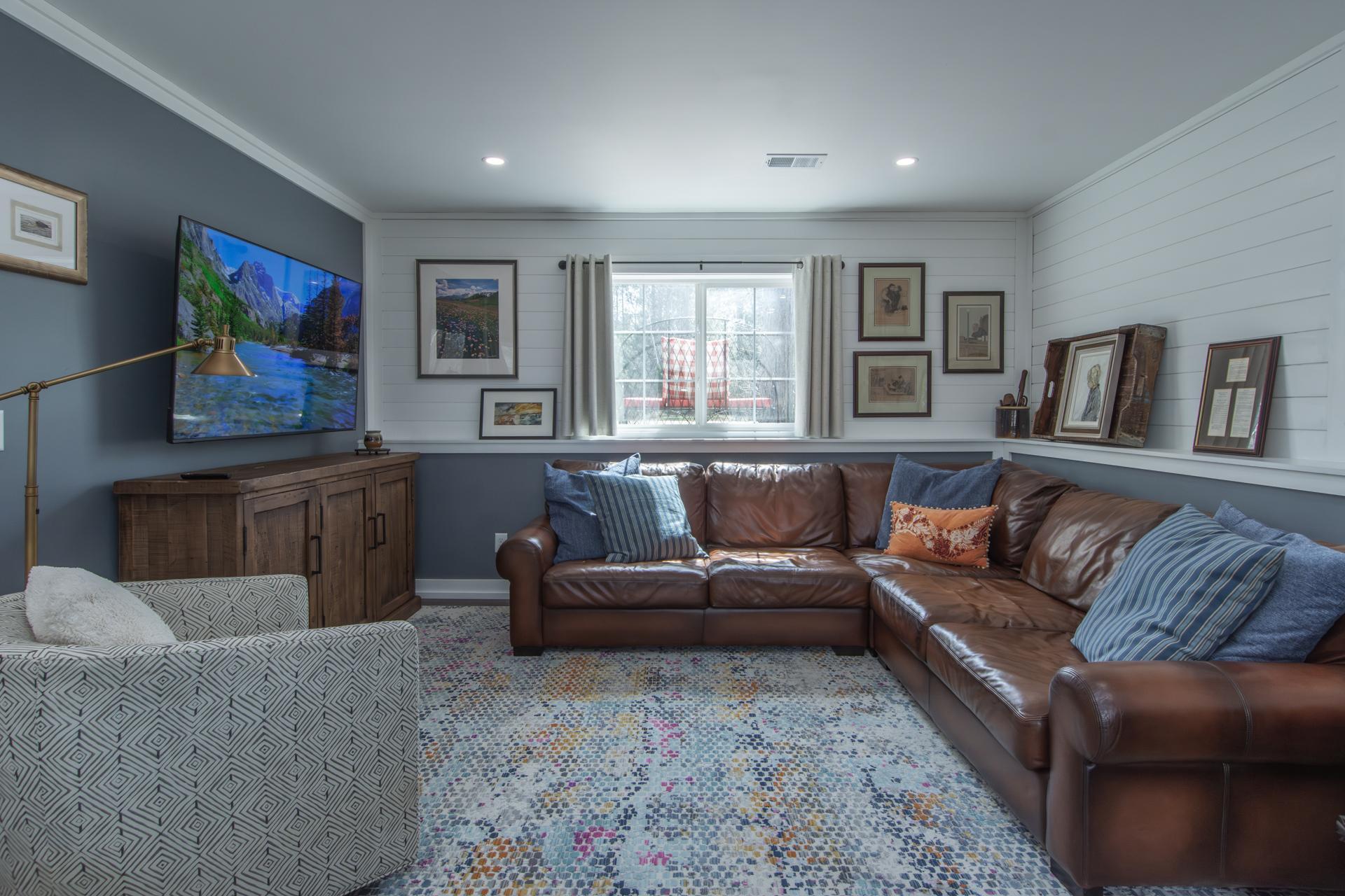 Finished basement adds a spacious family room—perfect for relaxing or entertaining.