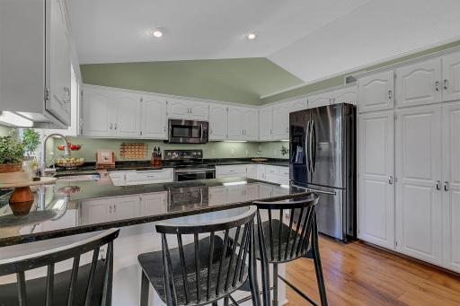Vaulted ceiling create an open feel throughout