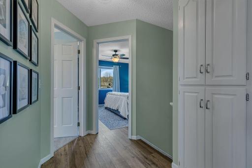 Upper level landing area. You'll find 3 bedrooms and a large full bathroom on this level. Great built-in storage as well