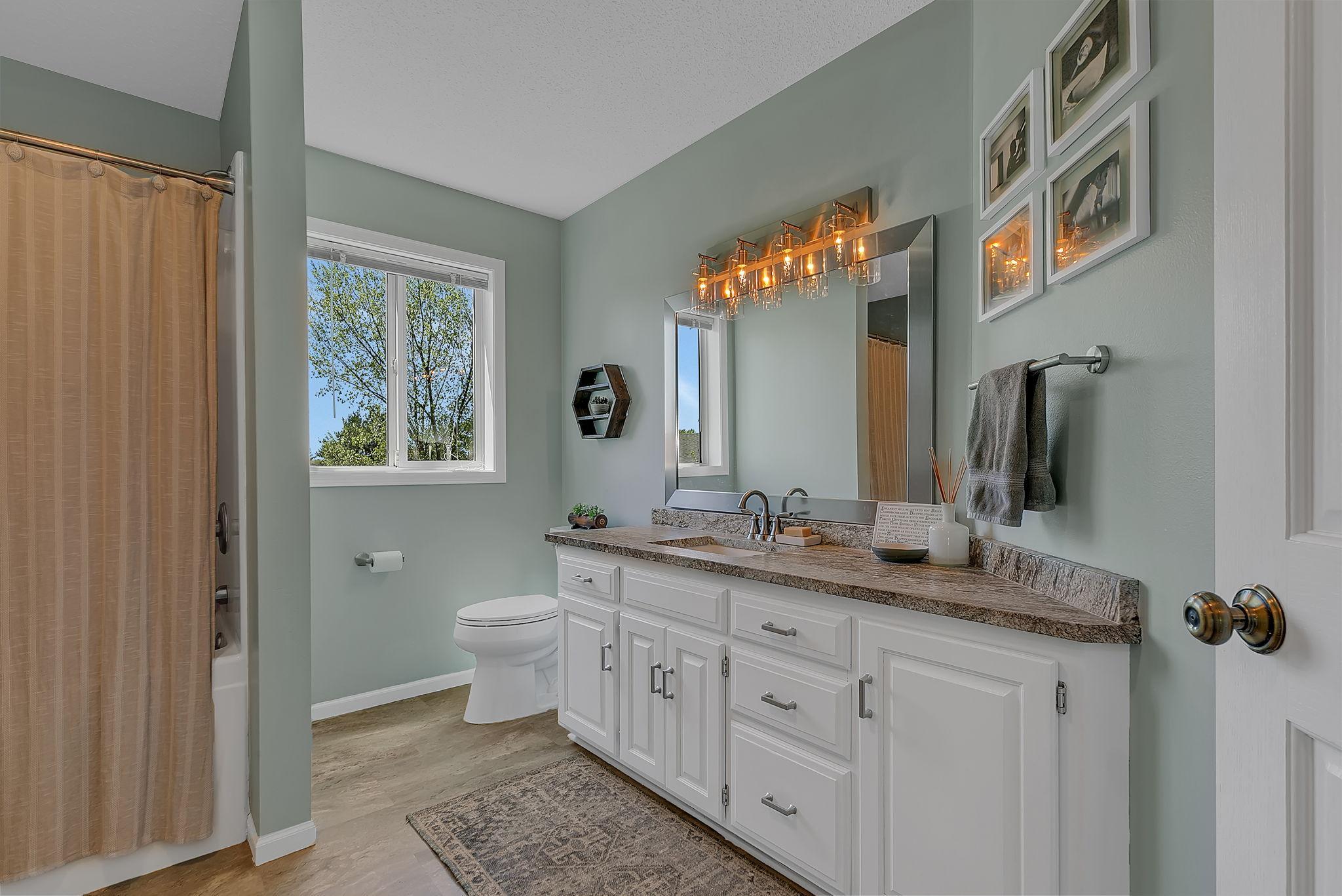 Recently replaced LVP flooring, beautiful granite countertops and once again, great lighting