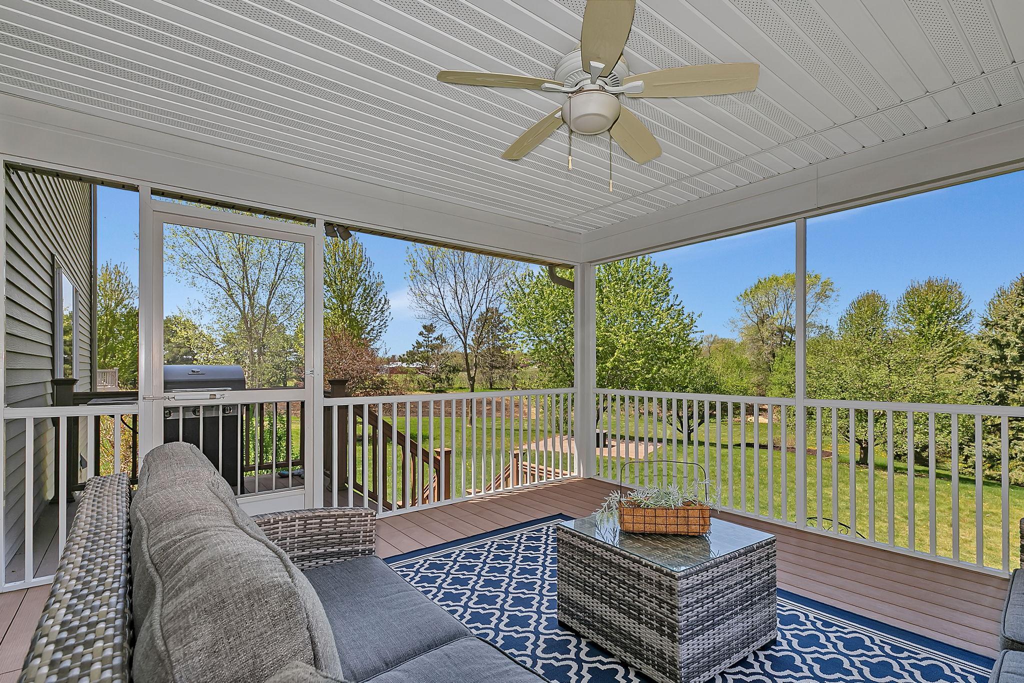 Convenient additional deck space for summer grilling just outside the screened portion