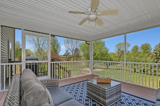 Convenient additional deck space for summer grilling just outside the screened portion