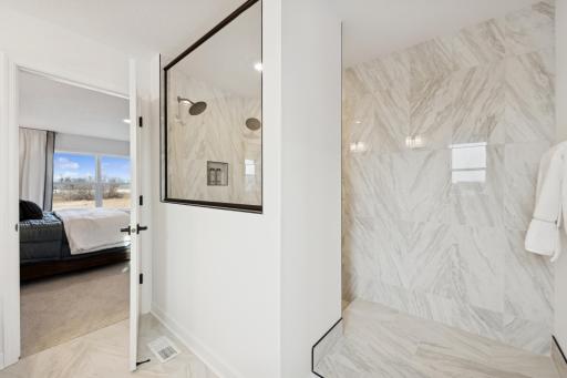 (Photo of a decorated model, actual homes finishes will vary) The serenity shower.