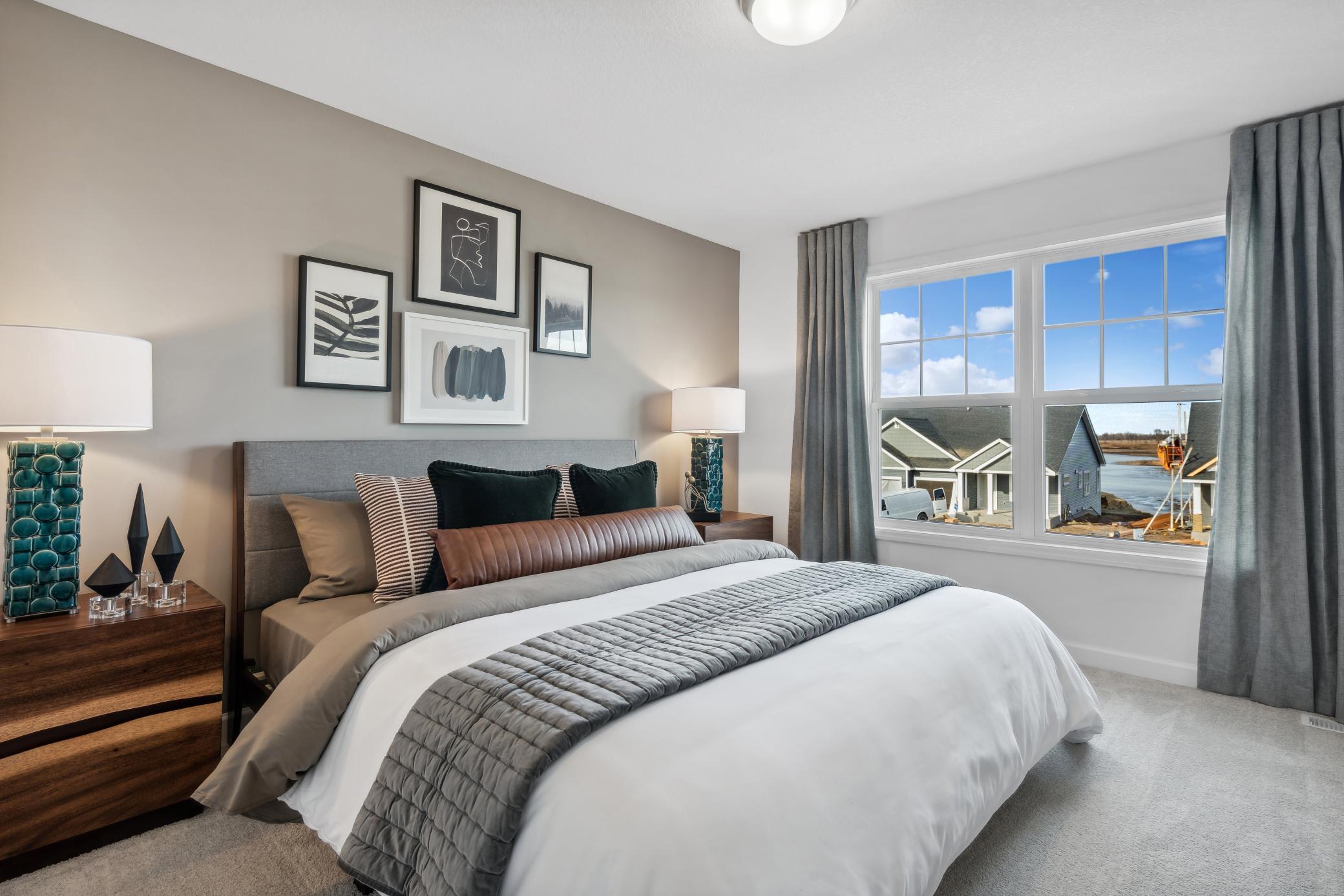 (Photo of decorated model, actual homes finishes will vary) Another secondary bedroom.