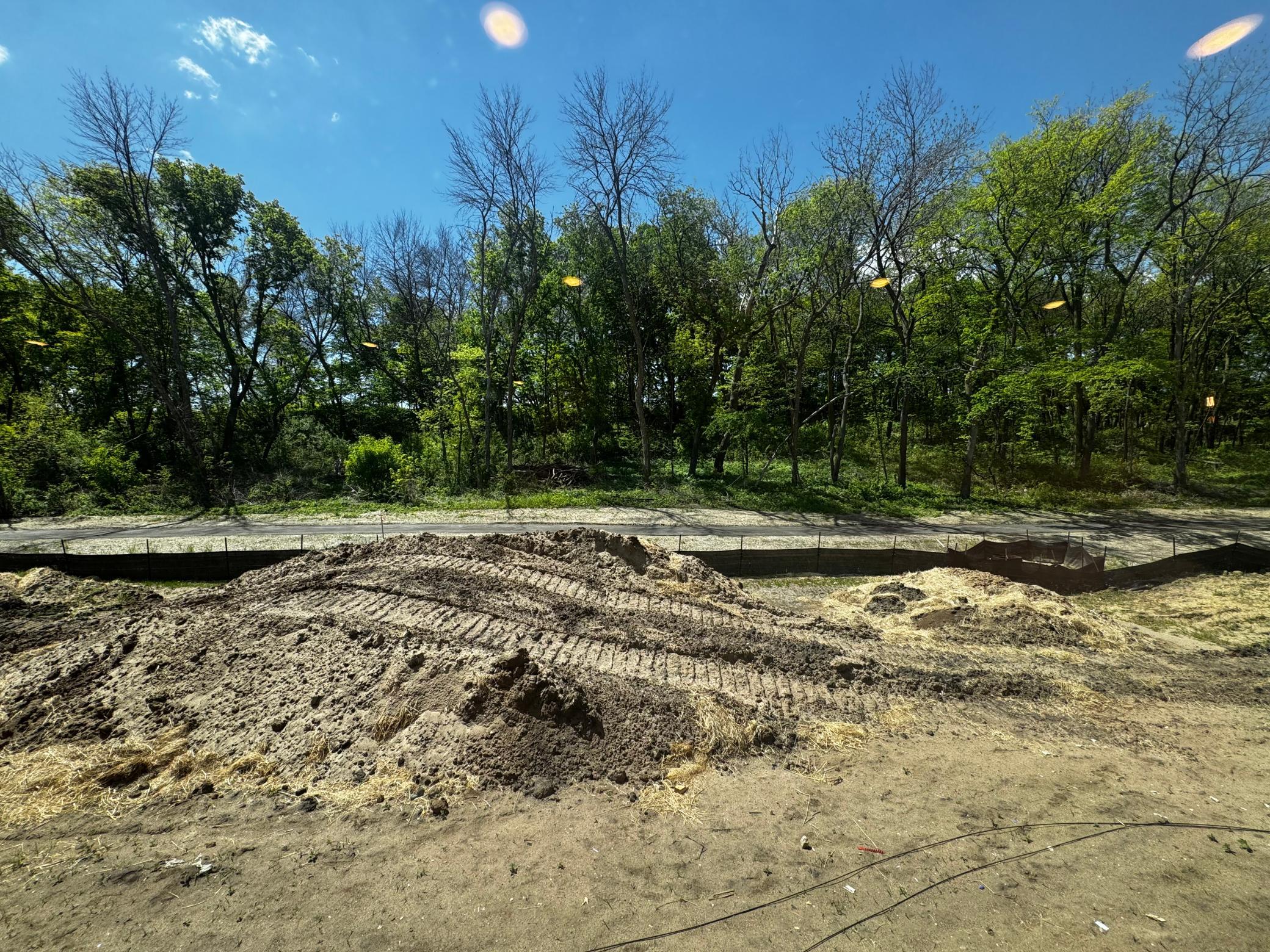(Photo is of the actual backyard in progress.)
