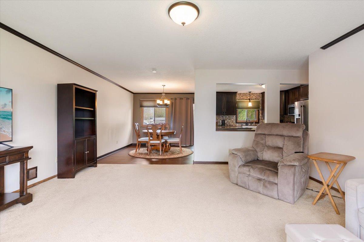 Upper level living room open kithcen