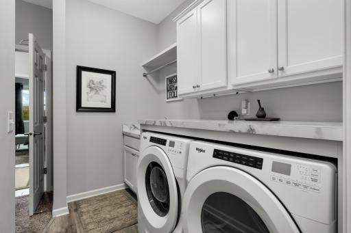 Main Level Laundry - Accessed through primary closet!