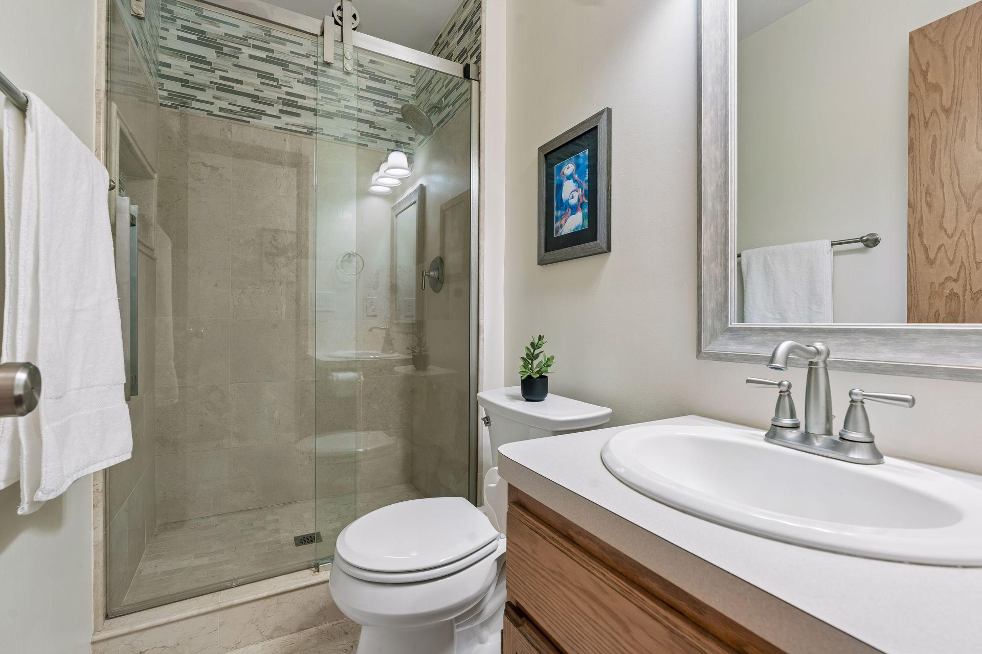 One of three nicely updated bathrooms - this one located on the main floor.