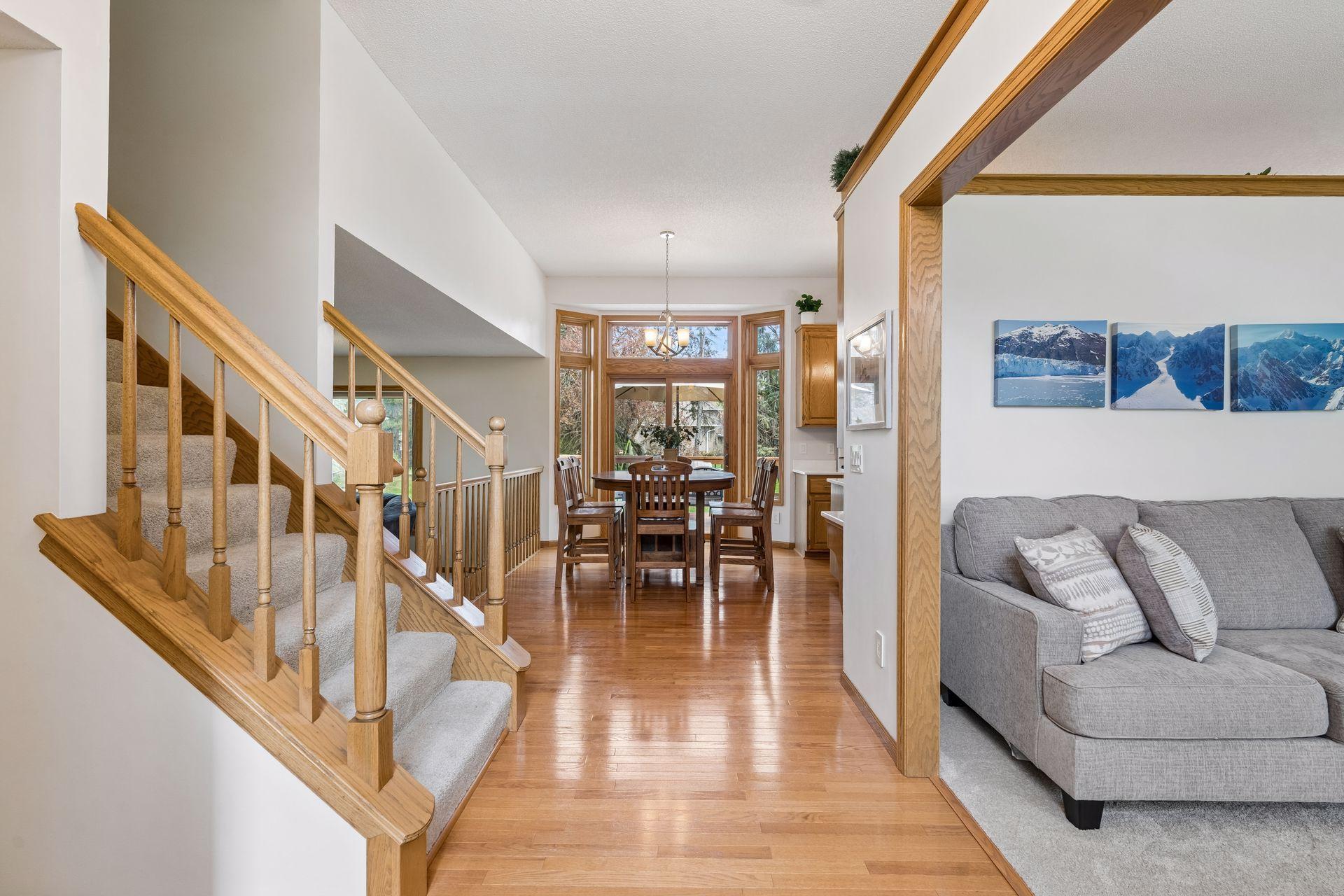 Welcome home! Light filled entry with views all the way to the back of the home. Living room is to the right, with entryway closet on the left.