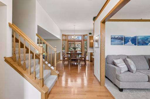 Welcome home! Light filled entry with views all the way to the back of the home. Living room is to the right, with entryway closet on the left.