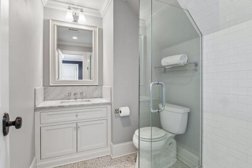 Carrera countertop and tile in ensuite bath.