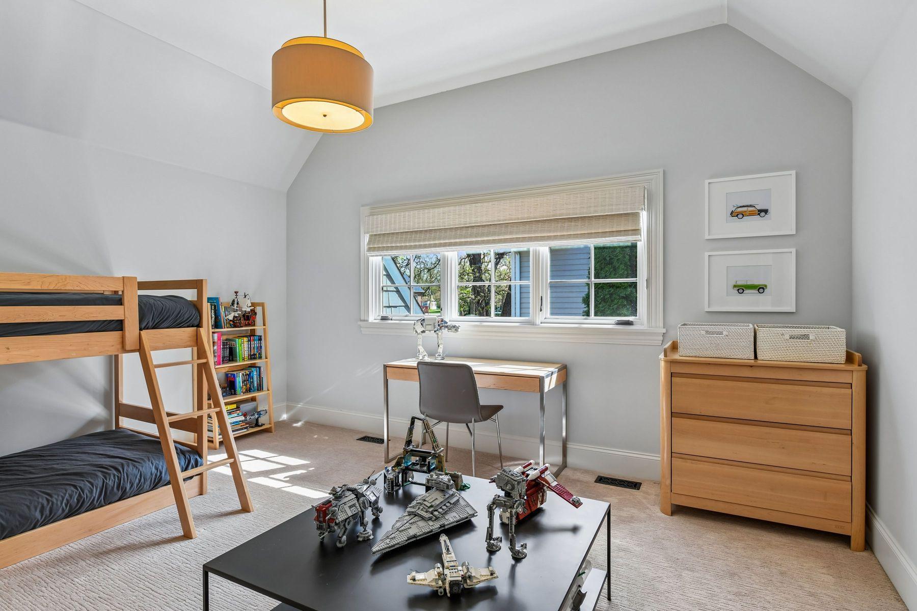 Spacious bedroom above the garage.