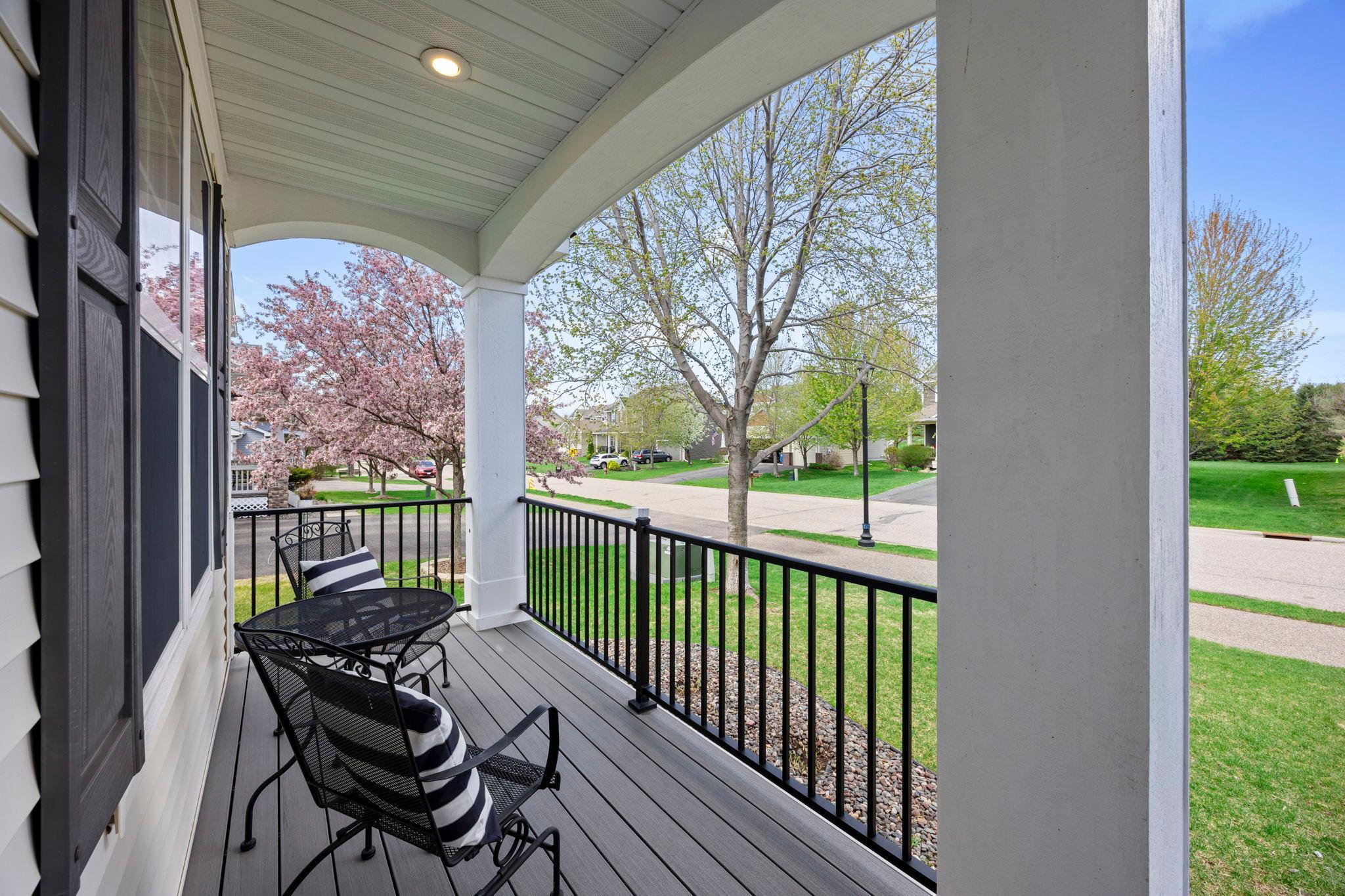 Step onto the charming, oversized front porch and into an inviting foyer.
