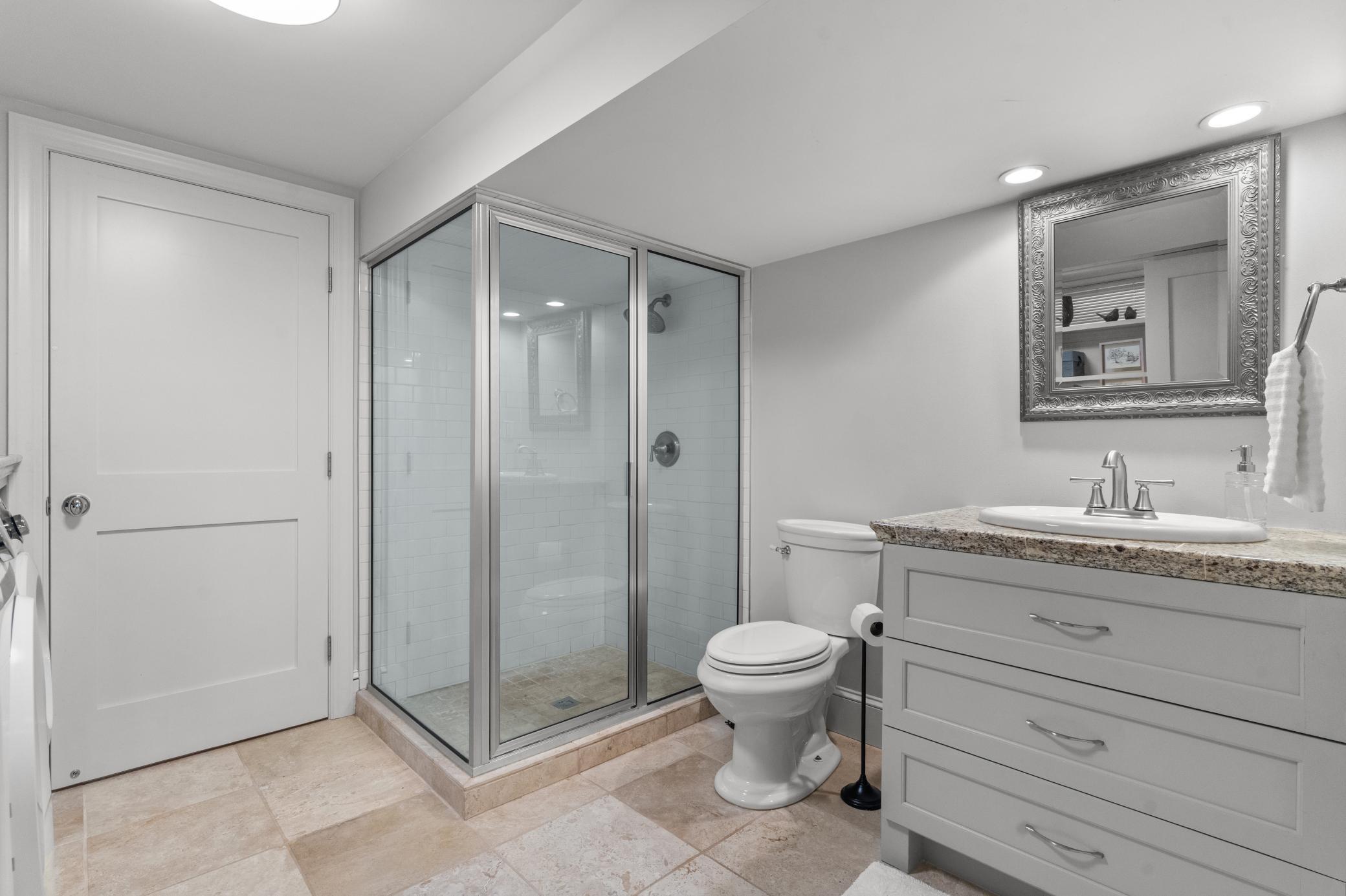 Also on this level is a combined laundry and ¾ bath.