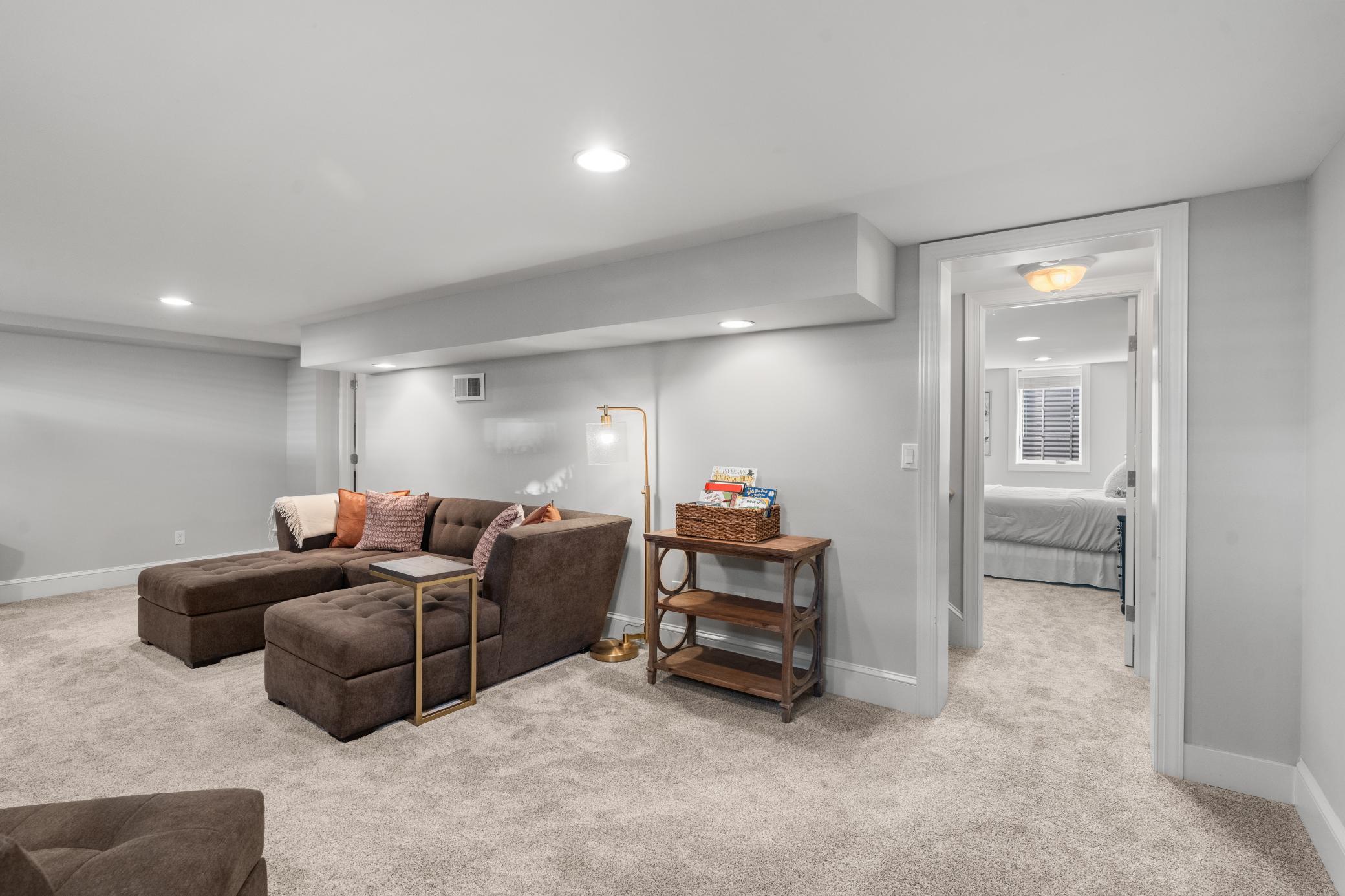 Another view from the family room, offering a glimpse into the lower-level third bedroom.