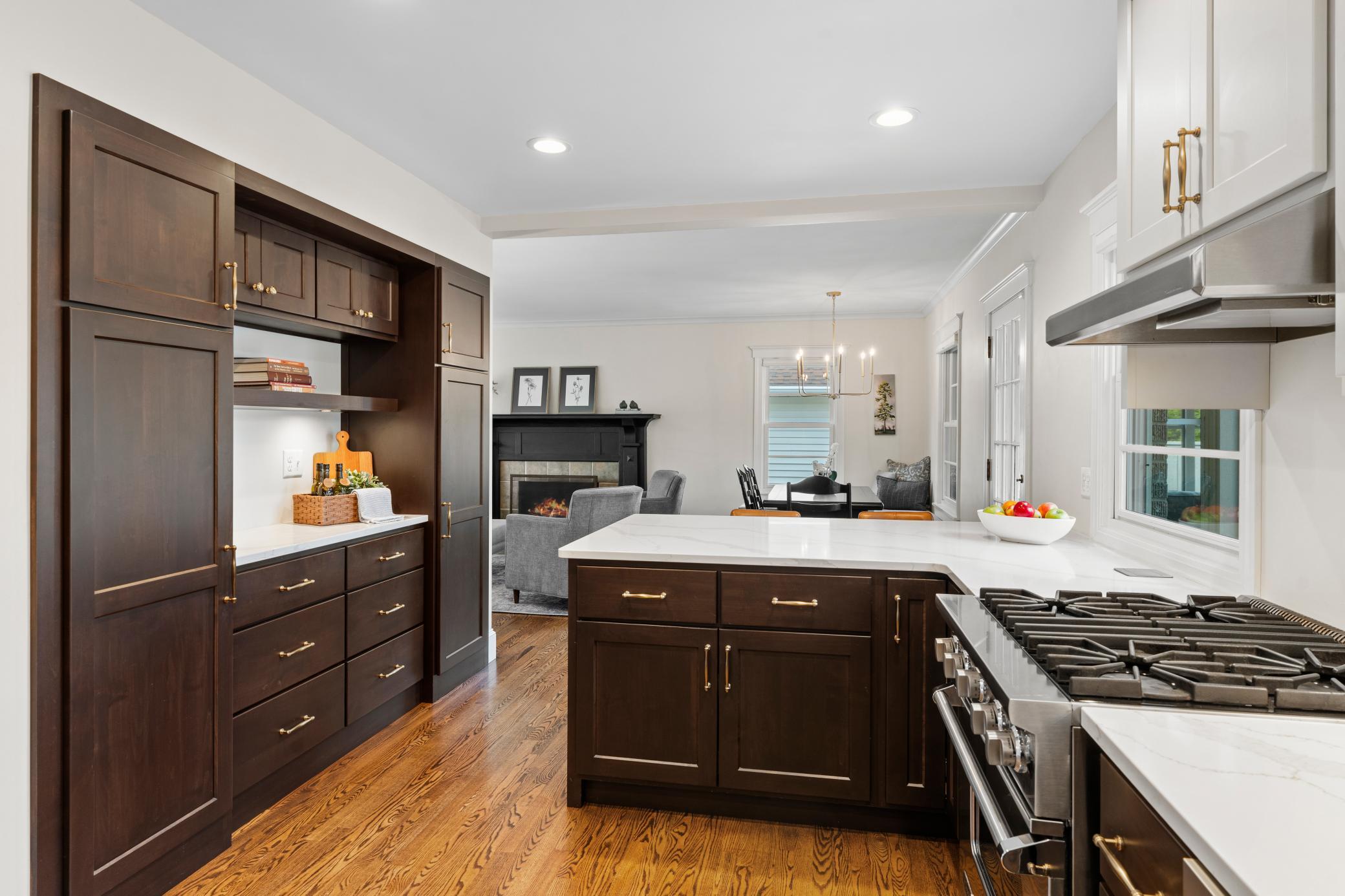 Offering both function and style, the kitchen transitions effortlessly into the main level living spaces.