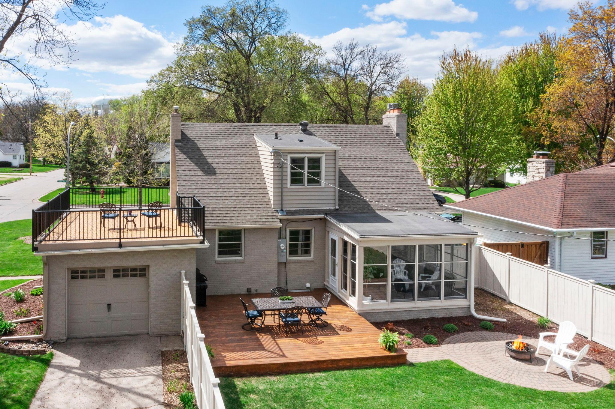 A rear exterior view of the home showcasing its outdoor spaces.