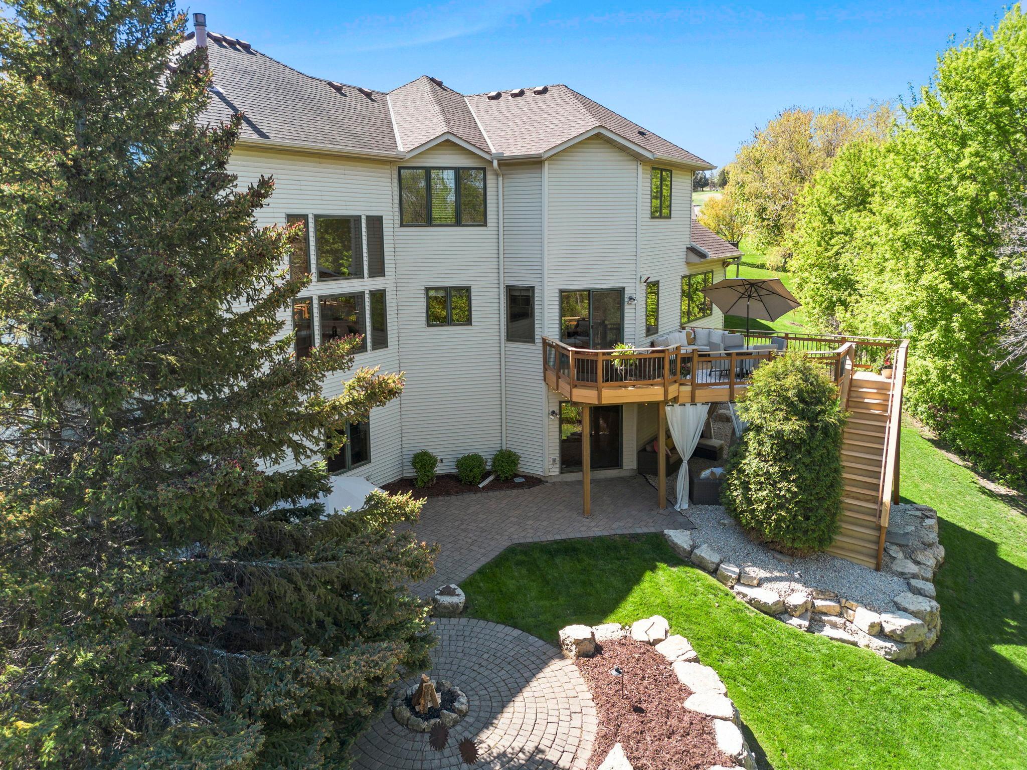 Another look at the rear exterior of the home, showcasing your private backyard retreat.
