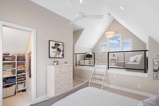 The room also offers a unique loft space, creating a private sitting area that adds even more character and versatility.