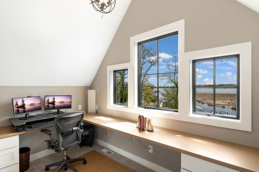 This bright and functional space is perfect as a work-from-home retreat, study area, or creative craft room.