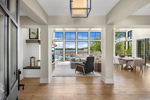 Youâre welcomed from the spacious front porch into an inviting foyer, where warm white oak floors carry throughout the home.