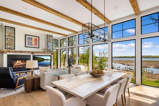 Highlighted by 12-foot wood-beamed ceilings and continued floor-to-ceiling Marvin windows that extend into the main living room.
