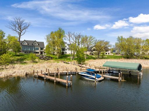 This exceptional property offers two private, permanent boat slips on Lake Minnetonka, providing effortless access to one of Minnesotaâs most sought-after lakes.