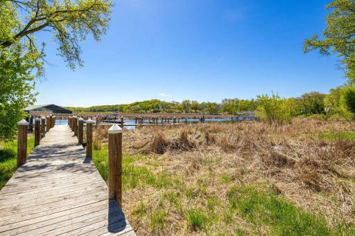 A path and dock leads to two private permanent boat slips.