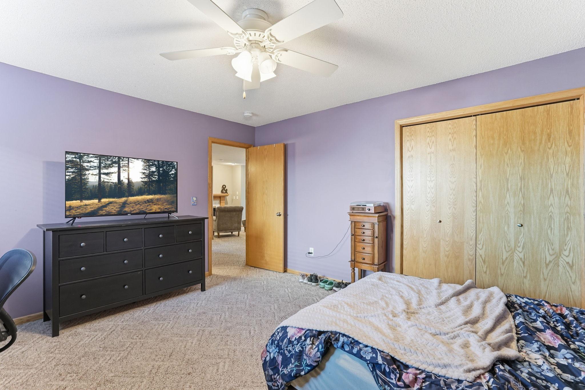 Well-sized fourth bedroom with ample closet space.