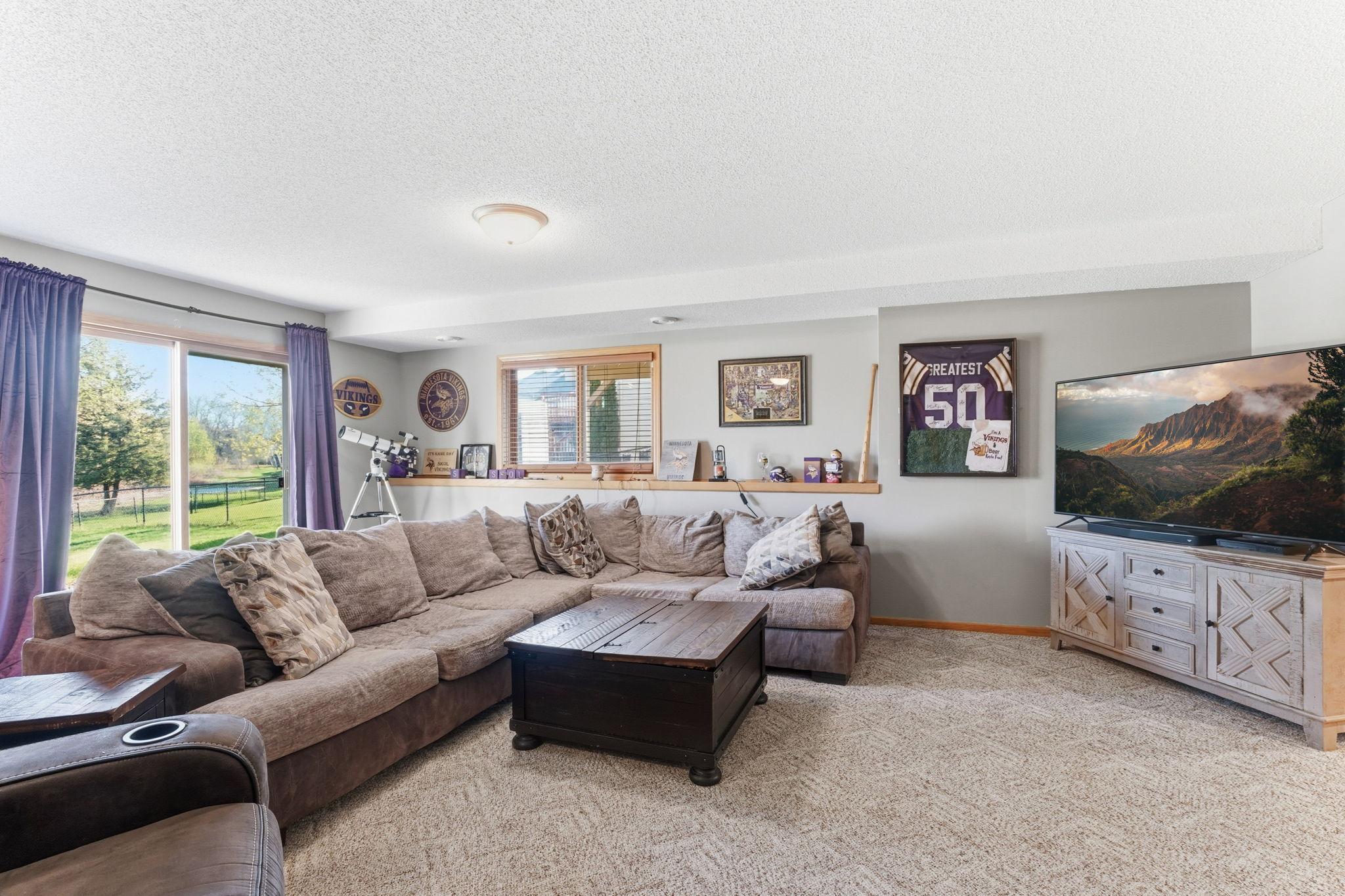 Relaxing living area perfect for sports or movie nights.