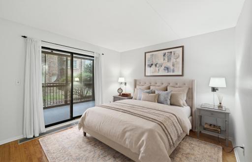 Primary Bed w/Access to Screened Porch Virtually Staged