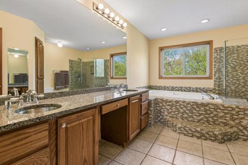 Primary bathroom with seperate shower and whirlpool tub